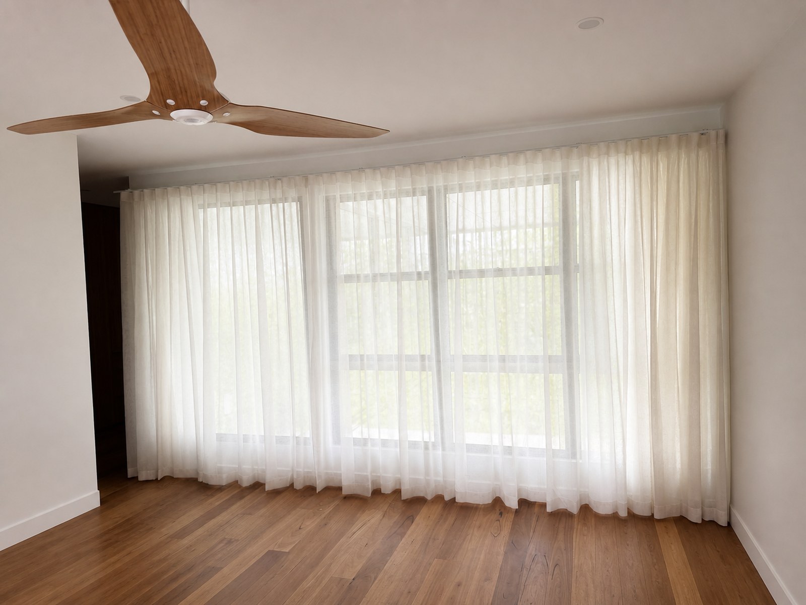 Wall-to-wall sheer curtains